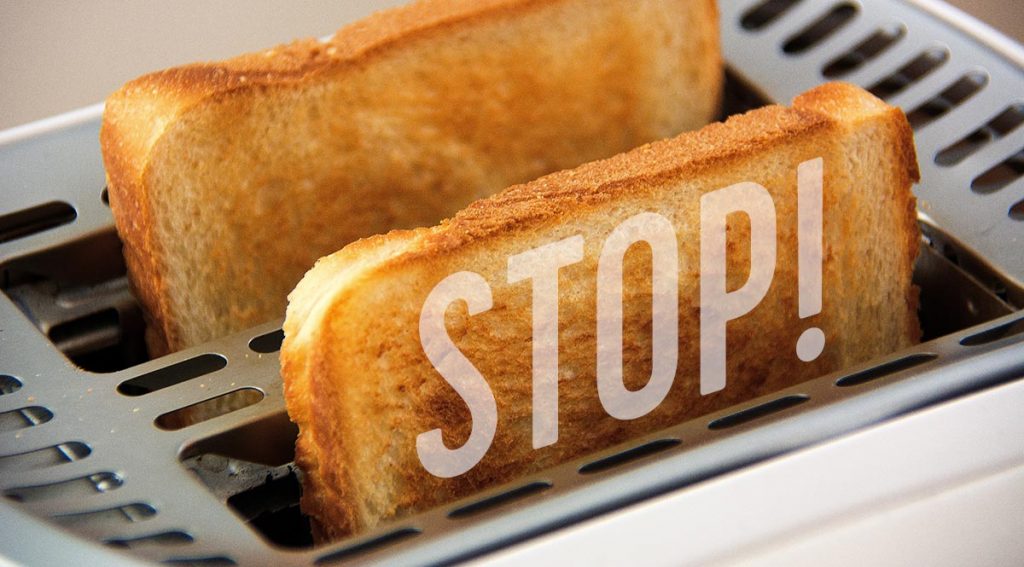 two slices of toast in toaster
